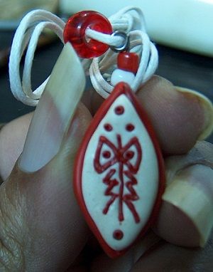 Cowrie Shell witch symbol meaning